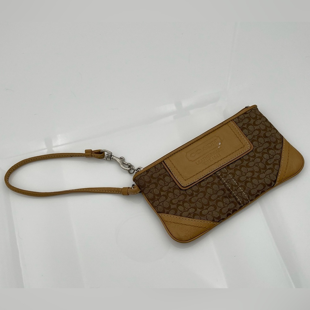 Authentic  Coach Beige Monogram Leather Wristlet